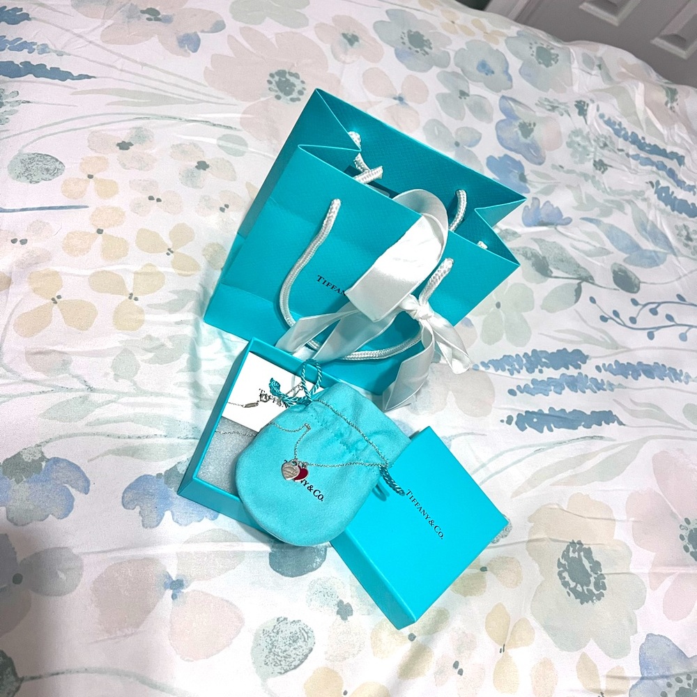 Authentic tiffany&co heart pendant in silver , Tiffany red mini..SOLD